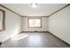 Sunlit living room, hardwood floors and large window at 2682 E 150 S, Anderson, IN 46017