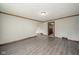Spacious living room with hardwood floors and access to hallway at 2682 E 150 S, Anderson, IN 46017