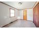 Simple bedroom with wood trim and carpet flooring at 2682 E 150 S, Anderson, IN 46017