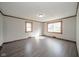 Spacious living room with hardwood floors and large windows at 2682 E 150 S, Anderson, IN 46017