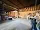 Attached garage with built-in shelving and workbench at 4839 Alameda Rd, Indianapolis, IN 46228