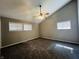Spacious bedroom with high ceiling, carpet and ceiling fan at 4839 Alameda Rd, Indianapolis, IN 46228