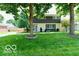 Ranch style home with gray siding, and a spacious lawn at 4839 Alameda Rd, Indianapolis, IN 46228
