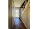 Bright entryway with tiled floor and staircase leading upstairs at 4839 Alameda Rd, Indianapolis, IN 46228