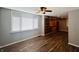 Bright bedroom with hardwood floors and built-in shelving at 4839 Alameda Rd, Indianapolis, IN 46228