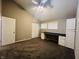 Bedroom with gray walls, ceiling fan and built-in desk at 4839 Alameda Rd, Indianapolis, IN 46228