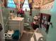 Bathroom with light teal tile and vanity at 4434 E 46Th St, Indianapolis, IN 46226