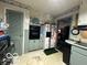View of kitchen with built-in oven and refrigerator at 4434 E 46Th St, Indianapolis, IN 46226