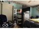 Bedroom with large TV and dresser at 4434 E 46Th St, Indianapolis, IN 46226