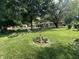 Landscaped backyard with a large grassy area at 4434 E 46Th St, Indianapolis, IN 46226