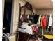 Basement closet with various clothing items at 4434 E 46Th St, Indianapolis, IN 46226