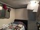 Small basement bedroom with a double bed at 4434 E 46Th St, Indianapolis, IN 46226
