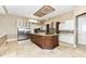 Spacious kitchen with granite island and custom cabinetry at 10881 Harbor Bay Dr, Fishers, IN 46040