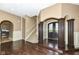 Grand entryway with hardwood floors, two-story ceilings and curved staircase at 10881 Harbor Bay Dr, Fishers, IN 46040