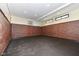 Finished game room with brick wall and basketball hoop at 10881 Harbor Bay Dr, Fishers, IN 46040