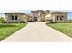Luxury home with stone and stucco exterior and three car garage at 10881 Harbor Bay Dr, Fishers, IN 46040