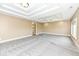 Spacious main bedroom with ensuite access and a stunning coffered ceiling at 10881 Harbor Bay Dr, Fishers, IN 46040