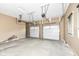 Spacious two-car garage with overhead storage at 10881 Harbor Bay Dr, Fishers, IN 46040