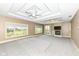 Main bedroom with fireplace, TV niche, and access to a private balcony at 10881 Harbor Bay Dr, Fishers, IN 46040