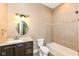 Bathroom with tiled shower and updated vanity at 10881 Harbor Bay Dr, Fishers, IN 46040