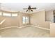 Spacious bedroom with a ceiling fan and a view at 10881 Harbor Bay Dr, Fishers, IN 46040