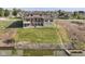 Aerial view of house on waterfront lot with private dock at 10881 Harbor Bay Dr, Fishers, IN 46040