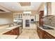Modern kitchen with double oven and granite countertops at 10881 Harbor Bay Dr, Fishers, IN 46040