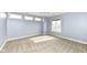 Well-lit bedroom with multiple windows and neutral walls at 10881 Harbor Bay Dr, Fishers, IN 46040