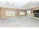 Large main bedroom with fireplace, multiple windows, and a private balcony at 10881 Harbor Bay Dr, Fishers, IN 46040