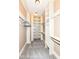 Spacious walk-in closet with ample shelving and hanging space at 10881 Harbor Bay Dr, Fishers, IN 46040