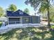 House aerial view showing backyard landscaping and a detached structure at 1521 Indiana Ave, Columbus, IN 47201