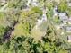 Aerial view of a large lot with mature trees, perfect for new construction at 1521 Indiana Ave, Columbus, IN 47201