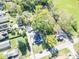 Aerial view of a house and neighborhood with lush green trees at 1521 Indiana Ave, Columbus, IN 47201