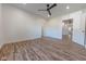 Spacious bedroom with hardwood floors and access to other rooms at 1521 Indiana Ave, Columbus, IN 47201