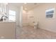 Clean bathroom with a shower/tub combo and tiled floors at 1521 Indiana Ave, Columbus, IN 47201