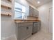 Modern kitchen with gray cabinets and wood countertops at 1521 Indiana Ave, Columbus, IN 47201