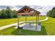 Relaxing picnic area with a covered pavilion and grill at 1114 Fleming Dr, Greenfield, IN 46140