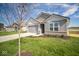 Two-story home with gray siding and attached garage at 1114 Fleming Dr, Greenfield, IN 46140