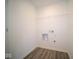 Laundry room with shelving and space for washer/dryer at 1114 Fleming Dr, Greenfield, IN 46140
