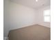 Spacious bedroom with neutral carpeting and large window at 1114 Fleming Dr, Greenfield, IN 46140