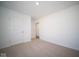 Bright bedroom with neutral walls and carpeting at 1114 Fleming Dr, Greenfield, IN 46140
