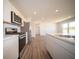 Open concept kitchen with stainless steel appliances at 1114 Fleming Dr, Greenfield, IN 46140