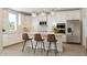 Modern kitchen with white cabinets, a kitchen island, and stainless steel appliances at 5714 Cloister Ln, McCordsville, IN 46055