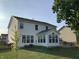 Two-story house with white siding and a sunroom at 5211 Nicodemus Dr, Plainfield, IN 46168