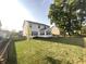 Two-story house with white siding and a sunroom at 5211 Nicodemus Dr, Plainfield, IN 46168