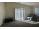 Living room with sliding glass door and recliner at 2801 Country Estates Dr, Indianapolis, IN 46227