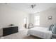 Spacious bedroom with large window, carpeted floors, and ensuite bathroom at 970 Fort Wayne Ave # 301, Indianapolis, IN 46202