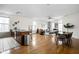Open living space with hardwood floors, kitchen island, and dining area at 970 Fort Wayne Ave # 301, Indianapolis, IN 46202