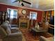 Living room with fireplace, built-in shelving, and comfortable seating at 3991 Bennett Dr, Indianapolis, IN 46254