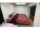 Basement bedroom with a queen-size bed and TV at 3991 Bennett Dr, Indianapolis, IN 46254